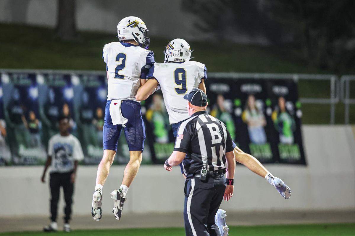 Keller receiver Ralph Crosby (2) and Brock Meek (9) celebrate Crosby’s TD reception at Northwest ISD Stadium in Justin, Texas, Friday, Nov. 7, 2025.