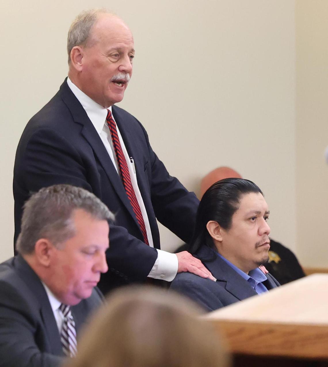 Defense attorney Warren St. John, left, rests his hands on Jason Thornburg’s shoulders while giving his closing argument in the sentencing phase of Thornburg’s trial on Wednesday, Dec. 4, 2024, at the Tim Curry Criminal Justice Center in Fort Worth. Thornburg was convicted of capital murder in the killings of three victims in September of 2021.