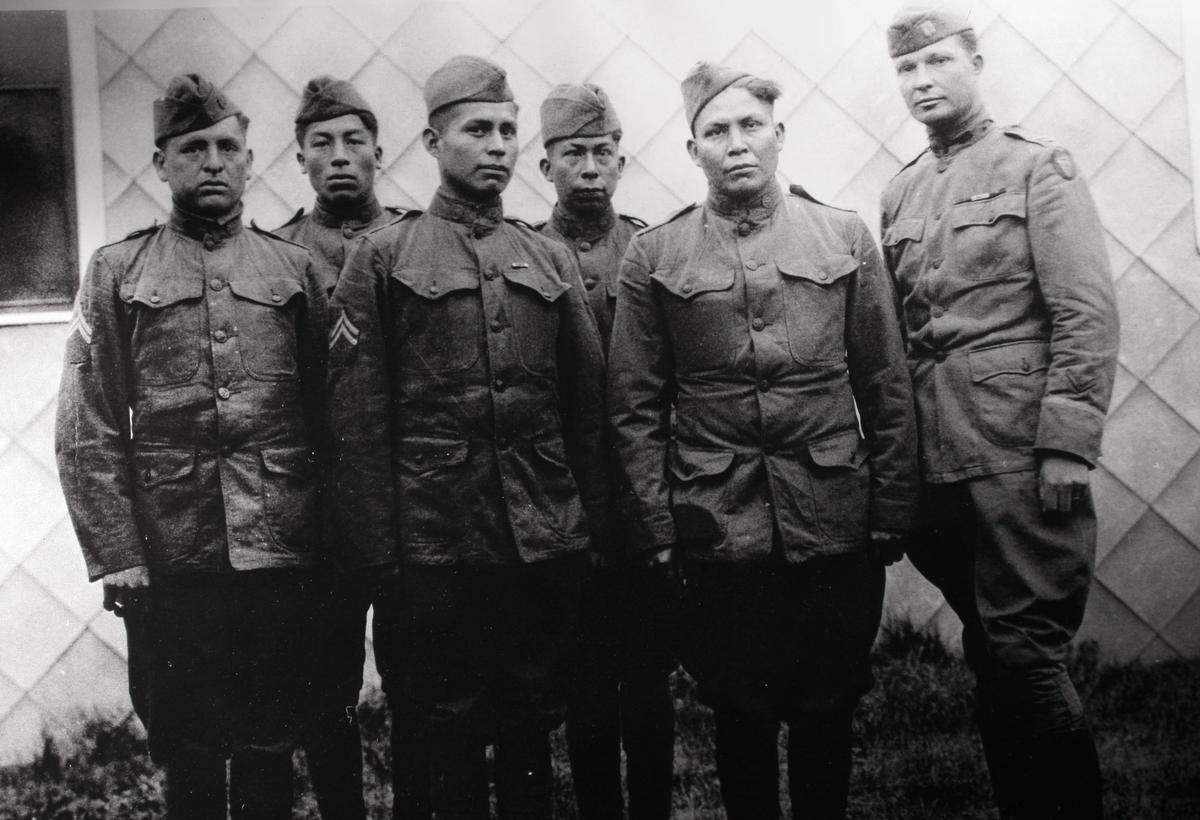Members of the World War I Choctaw Telephone Squad, 142nd Infantry, 36th Division, Company E. From left: Solomon Lewis, Mitchell Bobb, James Edwards, Calvin Wilson, Joseph Davenport and Capt. E.H. Horner.