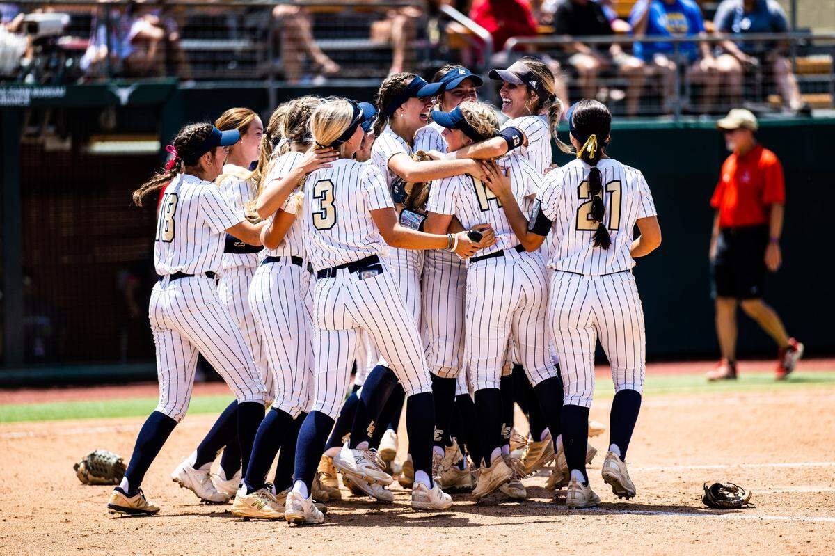 The Montgomery Lake Creek softball team celebrates after the final out and winning the Class 5A state championship against New Braunfels Canyon on Saturday, June 3, 2023, at McCombs Field in Austin, TX.