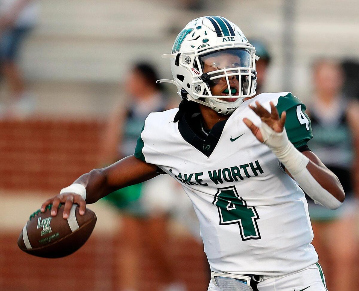 Lake Worth quarterback Isiah Hall (4) unloads a pass downfield during a high school football game at Owl Stadium in Joshua, Texas, Friday, Sept. 10, 2021. Lake Worth led Joshua by one at the half. (Special to the Star-Telegram Bob Booth)