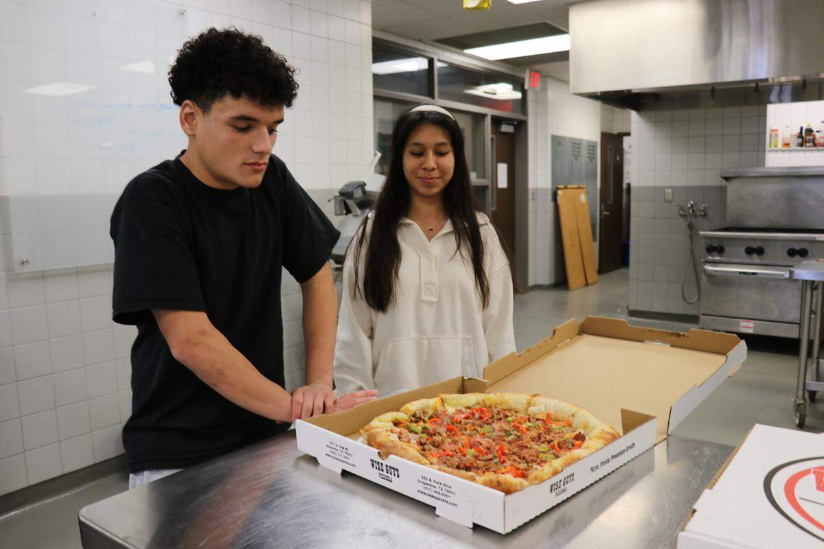 Jose Uscanga and Melina Olvera came up with the idea for “Gym Rat,” a high-protein pizza with a few different kinds of meat.