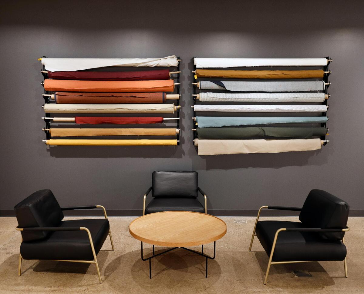 Bolts of fabric adorn a wall as art at Dickies offices in downtown Fort Worth Texas, Thursday Mar. 28, 2024. The 102 year old work apparel company recently relocated to downtown Fort Worth.