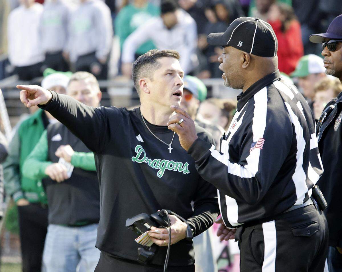 Southlake Carroll head coach Riley Dodge argues a call with the linesman during the second half of a Class 6A Division II state semifinal Saturday at Newsom Stadium in Mansfield.