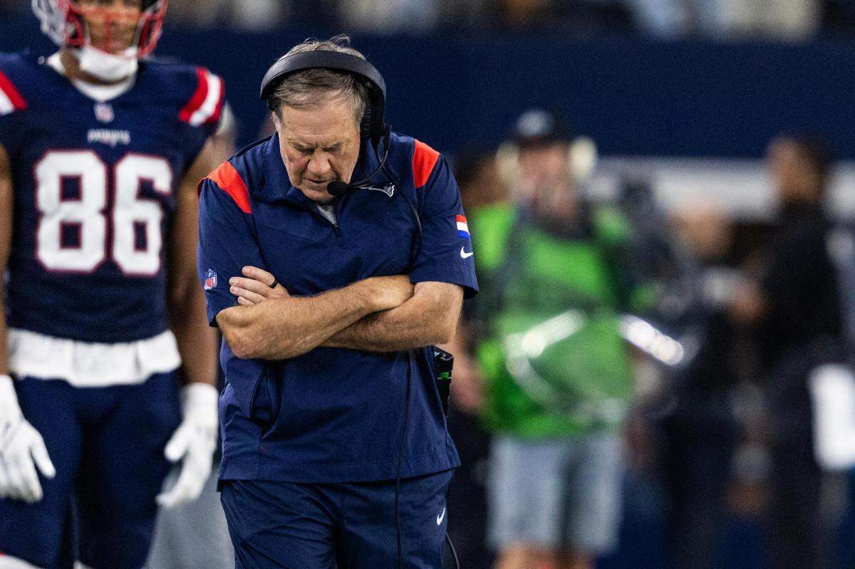 Patriots Head Coach Bill Belichick reacts to a Cowboys touchdown in the second half of an NFL game between the Dallas Cowboys and New England Patriots at AT&T Stadium in Arlington on Sunday, Oct. 1, 2023. The Cowboys defeated the Patriots 38-3.