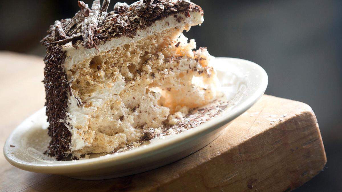 Black forest cake is the iconic desert of Swiss Pastry Shop in Fort Worth. Since its opening in 1973 the cake has been one of Fort Worth’s favorites. It features crushed almond baked into meringue layers between whipped cream and topped with chocolate shavings.