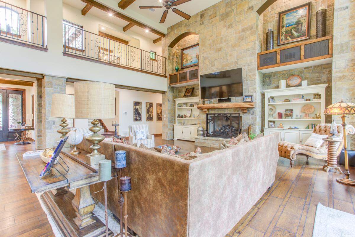 9930 Boat Club Road has 22-foot-tall ceilings decorated by wooden beams.