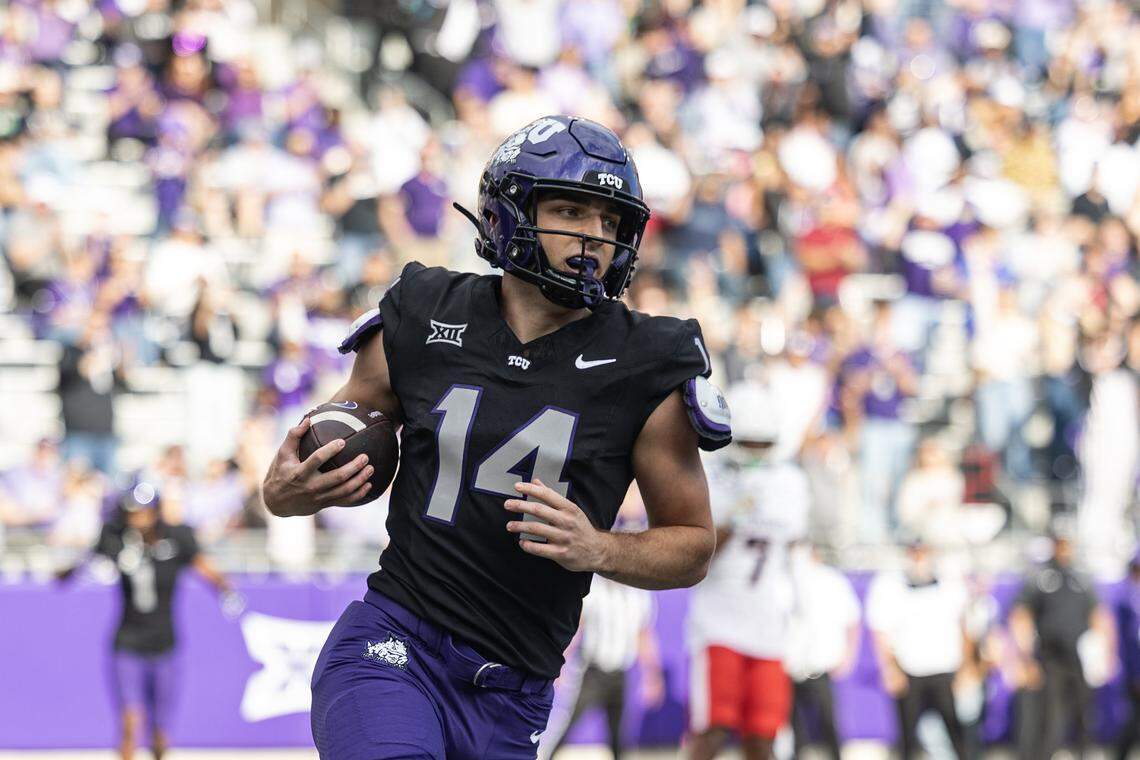 TCU wide receiver Joseph Manjack IV (14) scores a touchdown in the first half of a Big XII conference game between the TCU Horned Frogs and the Cincinnati Bearcats at Amon G Carter Stadium in Fort Worth on Saturday, Nov. 29, 2025.