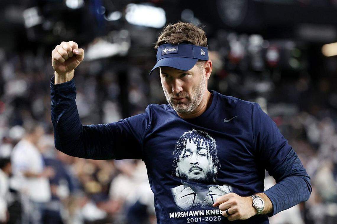 LAS VEGAS, NEVADA - NOVEMBER 17: Head coach Brian Schottenheimer of the Dallas Cowboys reacts after the game against the Las Vegas Raiders wearing a shirt honoring Marshawn Kneeland at Allegiant Stadium on November 17, 2025 in Las Vegas, Nevada. (Photo by Ian Maule/Getty Images)