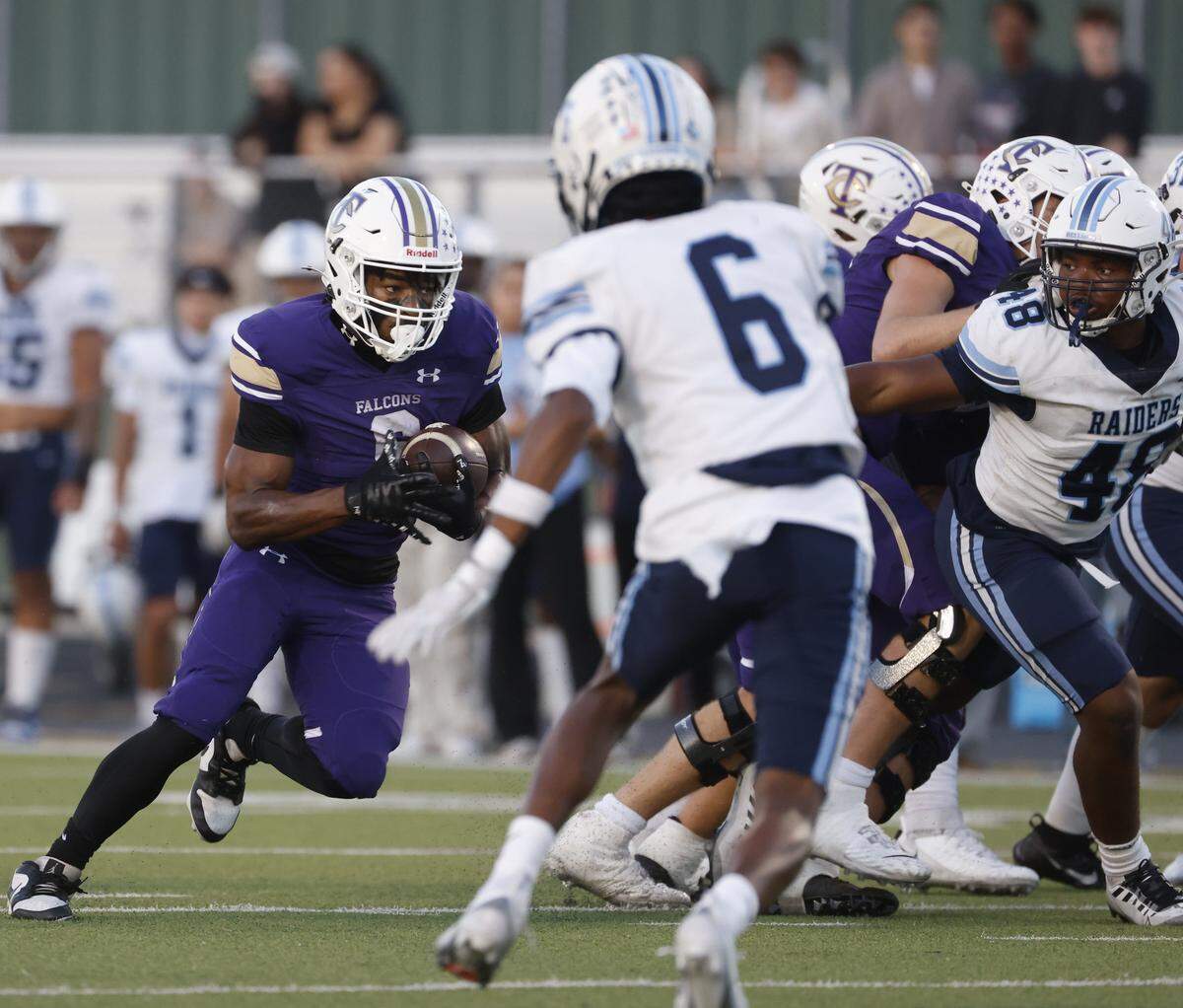 Timber Creek running back Daren Simmons attempts to run up the middle during the first half of a UIL football game between L.D. Bell and Timber Creek at Keller ISD Athletic Complex in Keller on Thursday, Sept. 11, 2025.