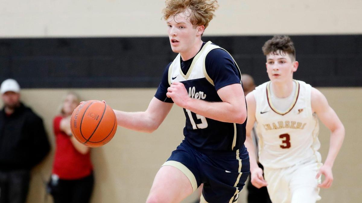 Keller’s Brooks Bahr (13) brings a rebound down court in front of Central guard Aiden Wall (3) during the second half of a 4-6A high school basketball game at Keller Central High School in Keller, Texas, Friday, Jan. 20, 2023. Keller defeated Central 66-58. (Special to the Star-Telegram Bob Booth)
