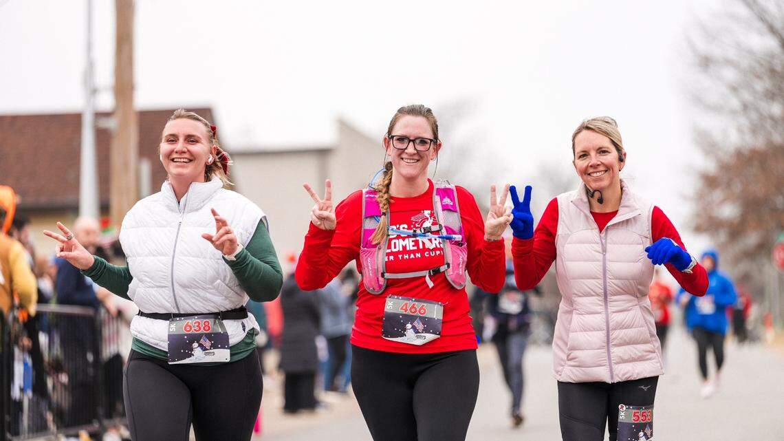 Abigail Phillips (middle) runs in the Freedom Frosty 5k in Bentonville, Arkansas after beating mesotheilioma.