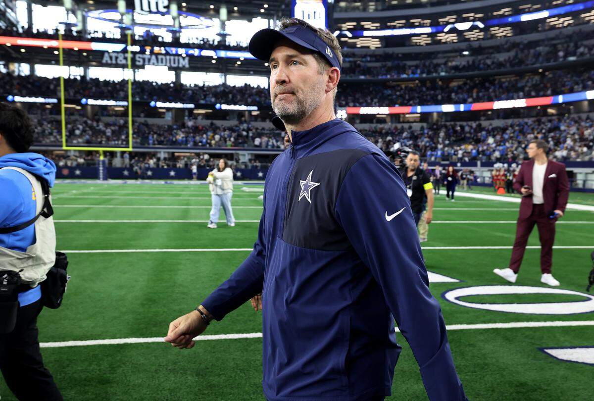 Dallas Cowboys head coach Brian Schottenheimer leaves the field after being defeated by the Los Angeles Chargers on Sunday, Dec. 21, 2025, at AT&T Stadium.