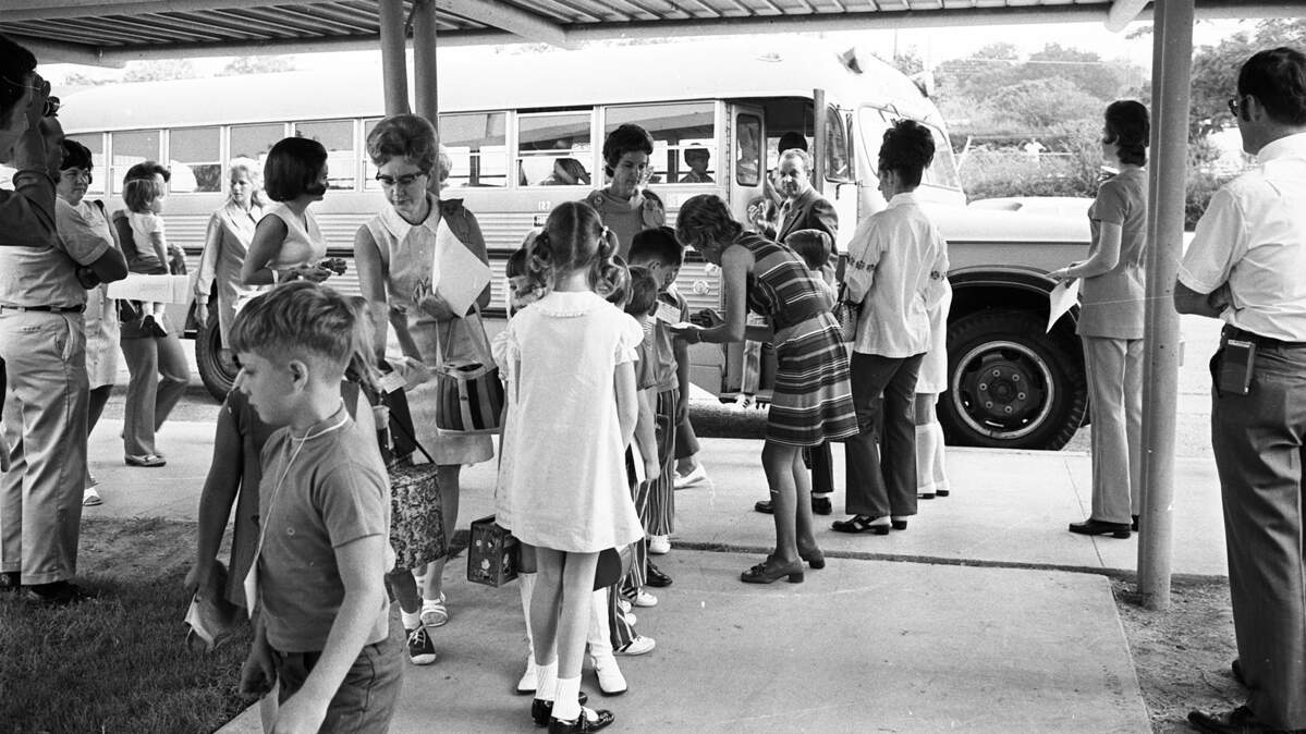 Aug. 30, 1971: School time again at Rosedale Park Elementary and the first yellow school bus brought these children. Teachers and parents and administration officials were on hand to give directions and assistance. Only the usual first morning confusion made short delays in school openings.