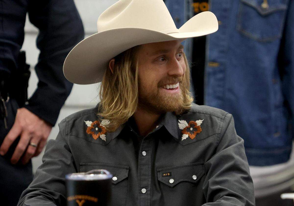 Eric Nelsen from ‘1883’ smiles while signing autographs for fans at the Fort Worth Stock Show & Rodeo on Tuesday, February 1, 2022.