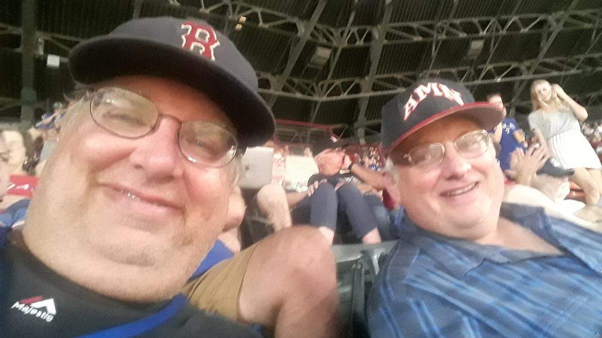 Ken Costlow, left, and brother, Kevin, have devoted most of their adult lives to keeping detailed history and statistics of each high school football team in the Arlington ISD. They started this labor of love in 1986.