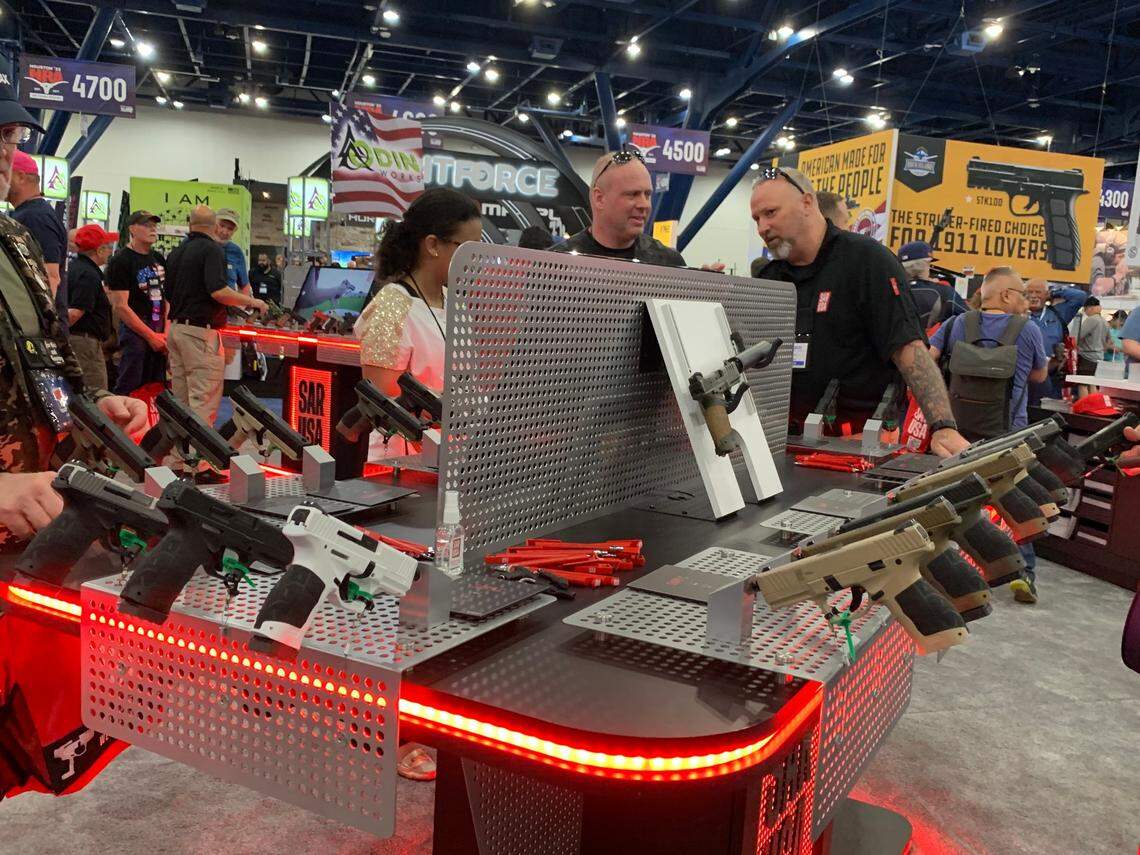 Rows of exhibitors packed a hall at the George R. Brown Convention Center in Houston for the NRA’s 2022 convention that began Friday.