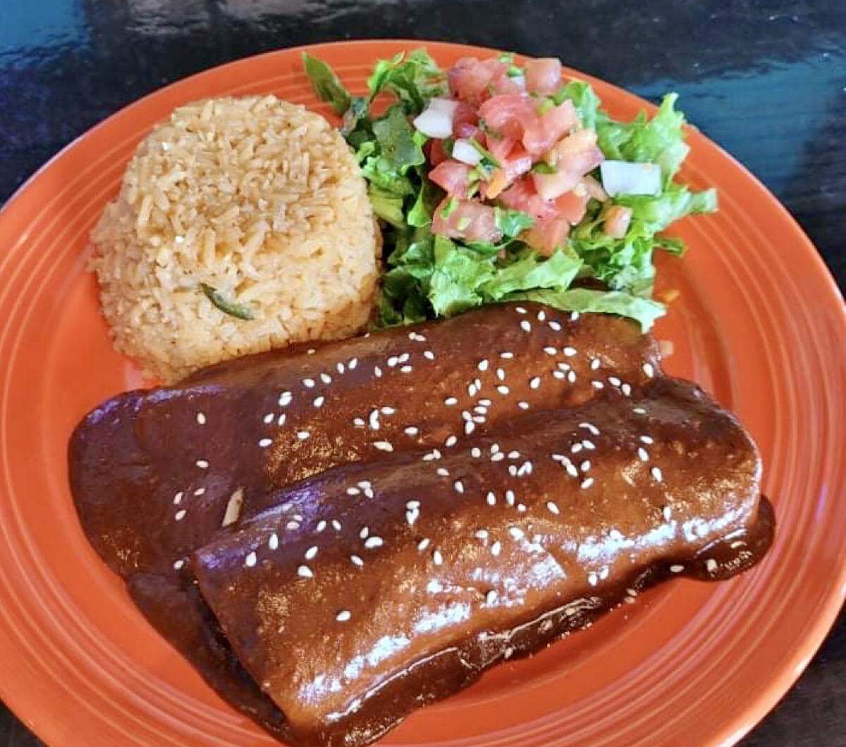 Chicken enmoladas (enchiladas in mole) at Enchiladas ¡Olé!.