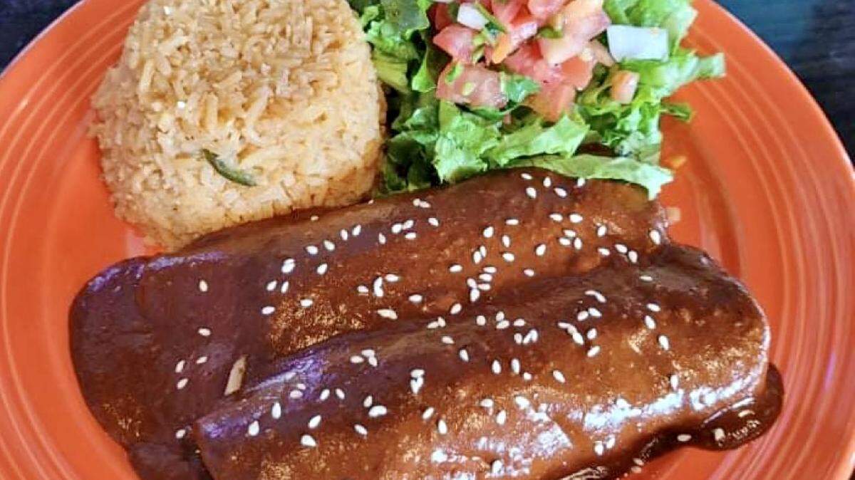Chicken enmoladas (enchiladas in mole) at Enchiladas Ole.