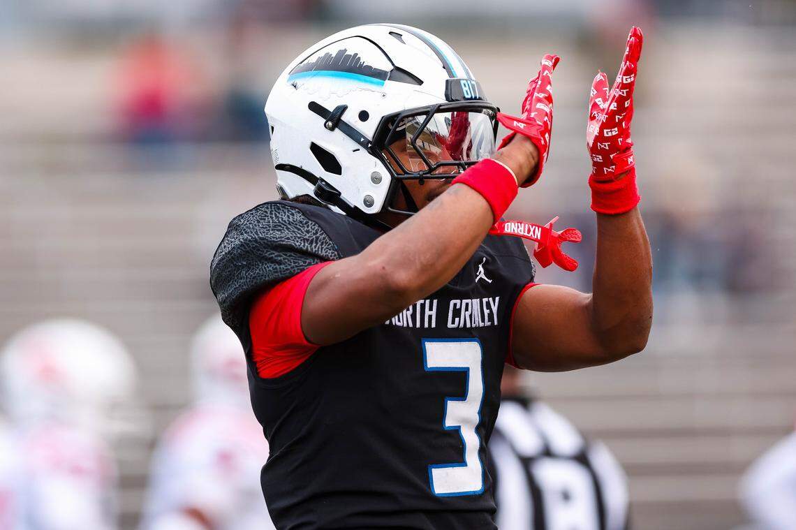 North Crowley running back G'Yrell Smith flicks his hands in the air after rushing for a touchdown in a Class 6A Division I regional playoff Saturday, Nov. 29, 2025, at Midlothian ISD Stadium in Midlothian.