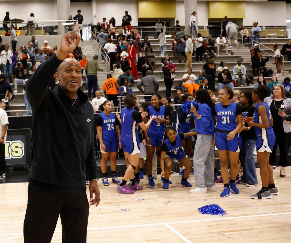 Fort Worth Boswell head coach John Reese tells the crowd, “One, more, one more.” after winning the UIL Class 6A D2 state semifinal girls basketball game against Lancaster at The Colony High School in The Colony, Texas, Tuesday, Feb. 25, 2025.