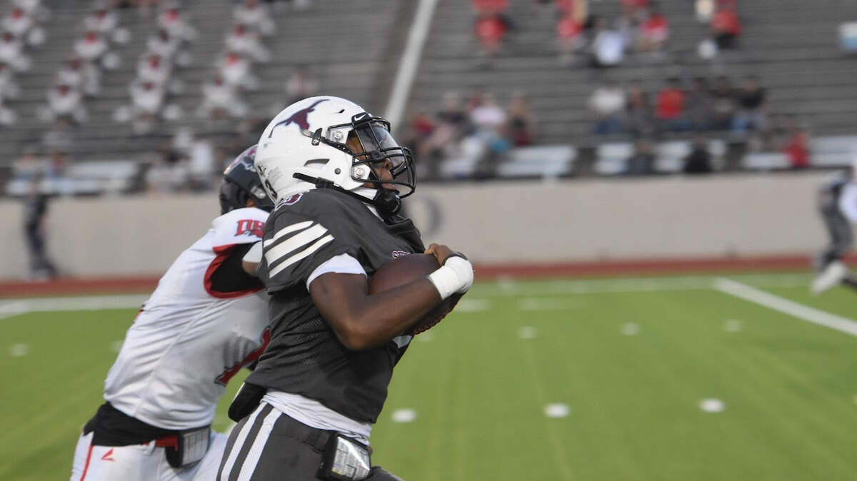 Junior Trustin Holland from North Side scores a running touchdown during a high school football game against Diamond Hill-Jarvis at Farrington Field in Fort Worth, Texas Thursday, September 5, 2024.