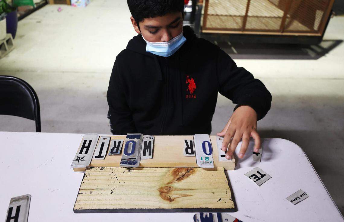 Robert Cardona, 13, works on an art project while attending Project Success on Tuesday, November 16, 2021, at Art of Living in Fort Worth. The Art of Living is a non-profit that provides art therapy and enrichment programs to children staying at the Presbyterian Night Shelter.