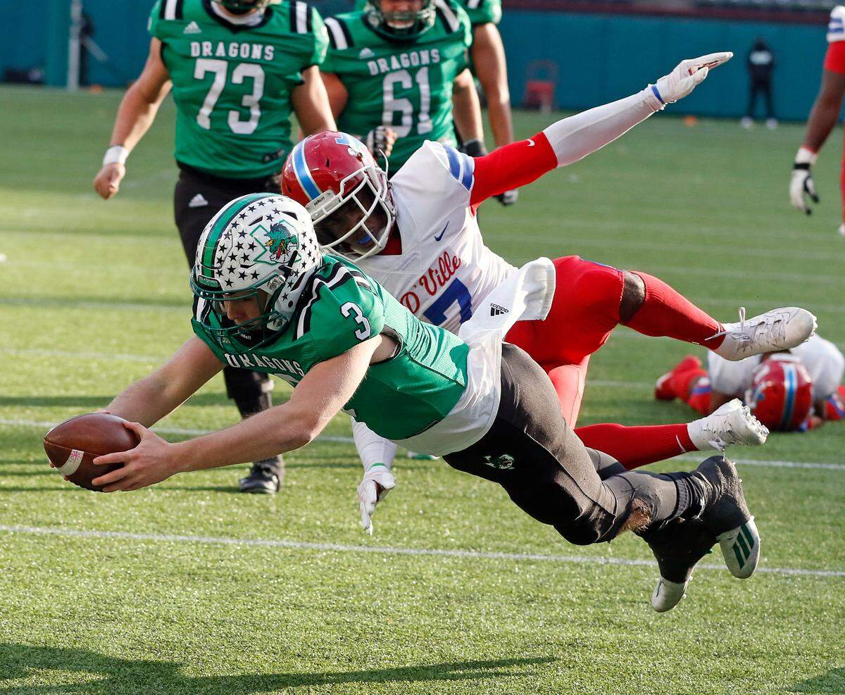 Southlake’s Quinn Ewers dives into the end one for a touchdown during the Conference 6A Division 1 2020 state championship semi-final football game at Globe Life Park in Arlington, Texas, Saturday, Jan. 09, 2021. Duncanville led 27-21 at the half. (Special to the Star-Telegram Bob Booth)