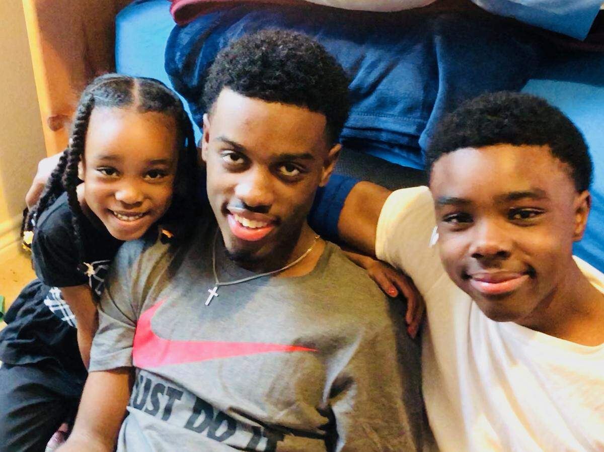 Shaelynn, 5, Brandon, 17, and Jackson Reed, 14, at their home in Saginaw.