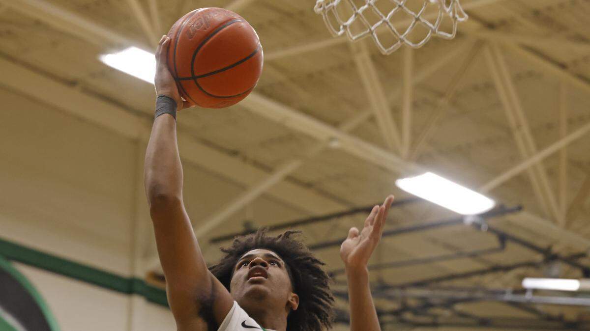 Kennedale Bryson Nickerson (22) drops in a right handed layup during the first half of a UIL boys basketball game between Alvarado and Kennedale at Kennedale High School in Kennedale, Texas, Tuesday Jan. 13, 2026