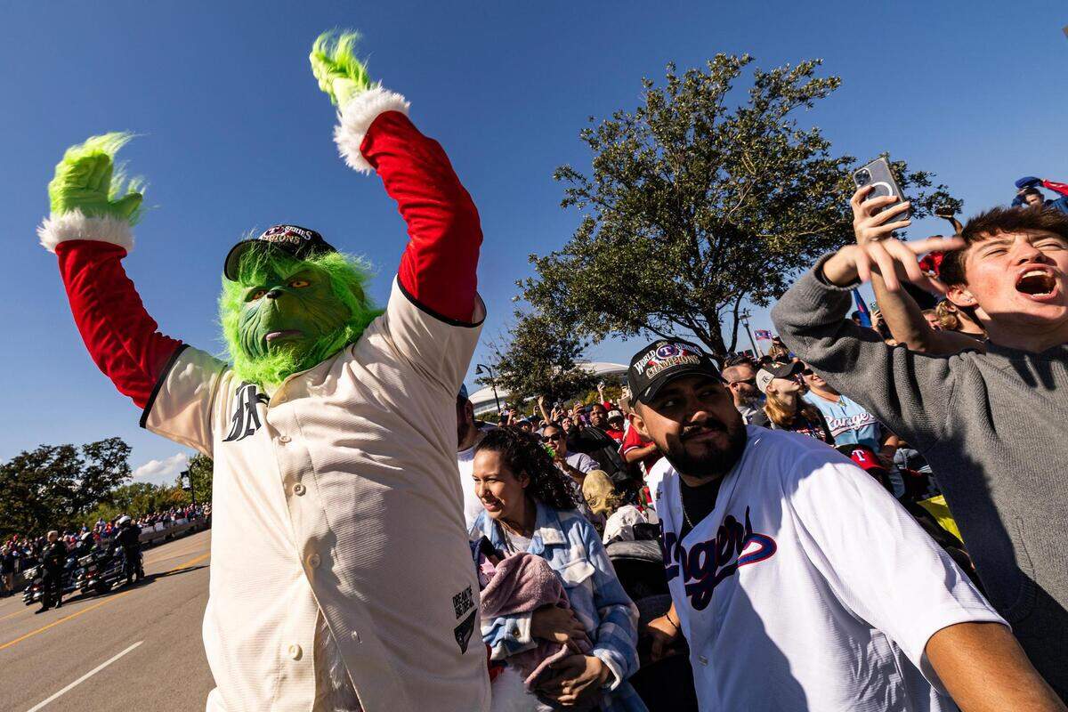 Rangers fans gather to celebrate the Texas Rangers World Series championship for the World Series Parade in front of Globe Life Field in Arlington on Friday, Nov. 3, 2023.