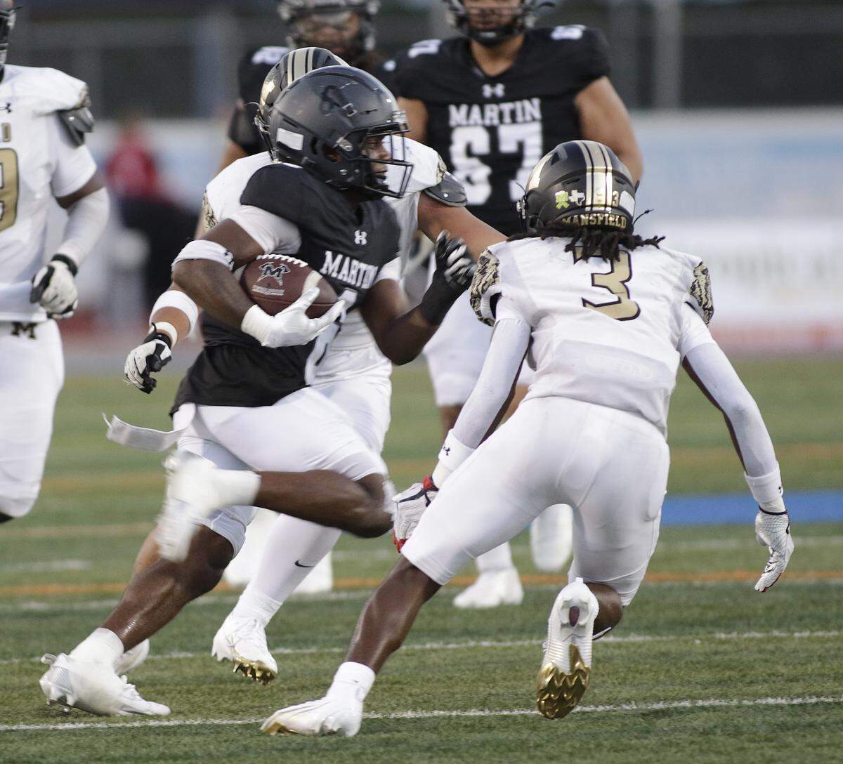 Arlington Martin’s Daylon Cobb (6) picks up yardage against Mansfield during their game on Thursday, September 11, 2025 at Maverick Stadium in Arlington Texas.