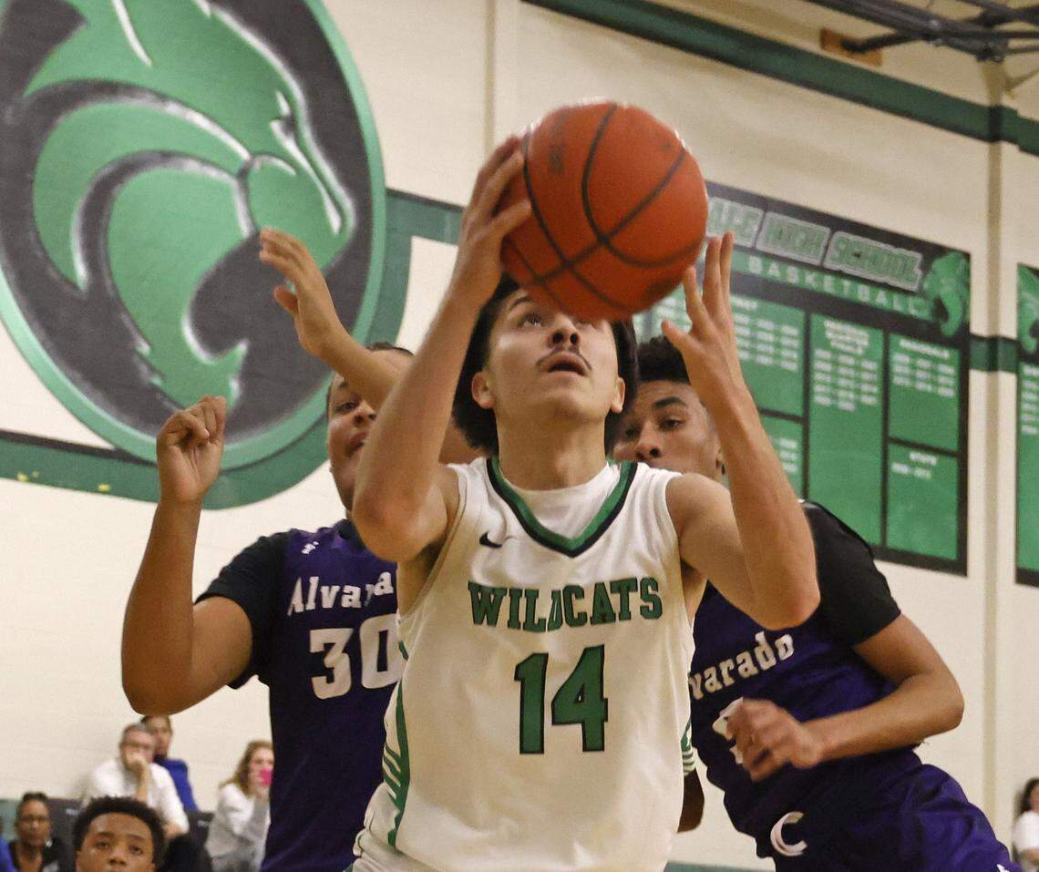 Kennedale shooting guard Jayden Mancha (14) puts up a number during the first half of a UIL boys basketball game between Alvarado and Kennedale at Kennedale High School in Kennedale, Texas, Tuesday Jan. 13, 2026