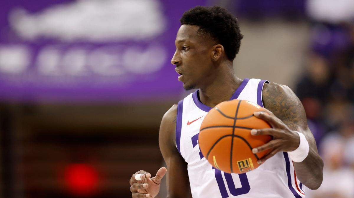 TCU guard Damion Baugh handles the ball during the first half against West Virginia on Tuesday.