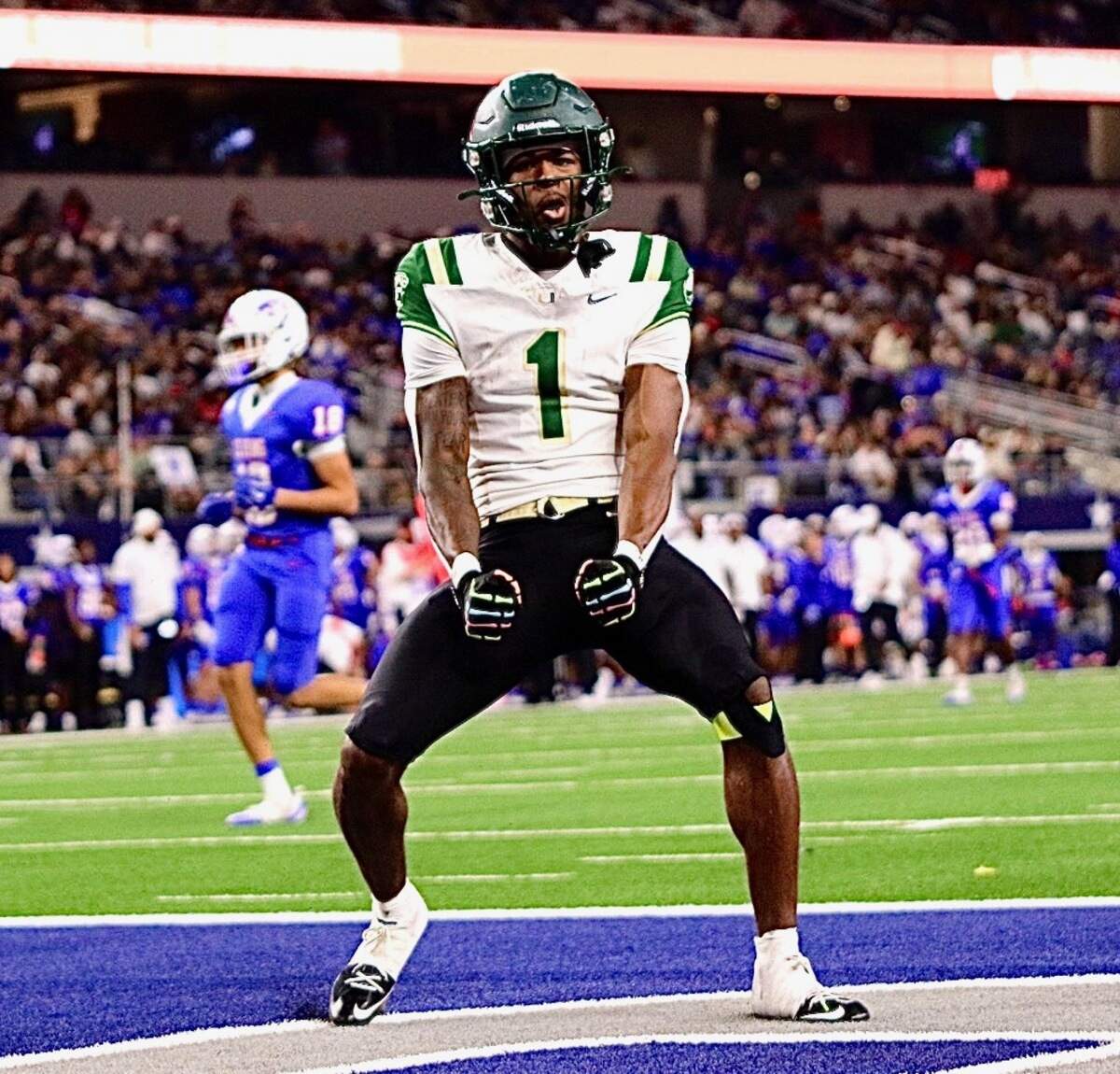 DeSoto wide receiver Ethan Feaster (1) celebrates after scoring a touchdown against Houston King in the Class 6A Division II state championship game on Saturday, Dec. 20, 2025 at AT&T Stadium in Arlington, Texas.