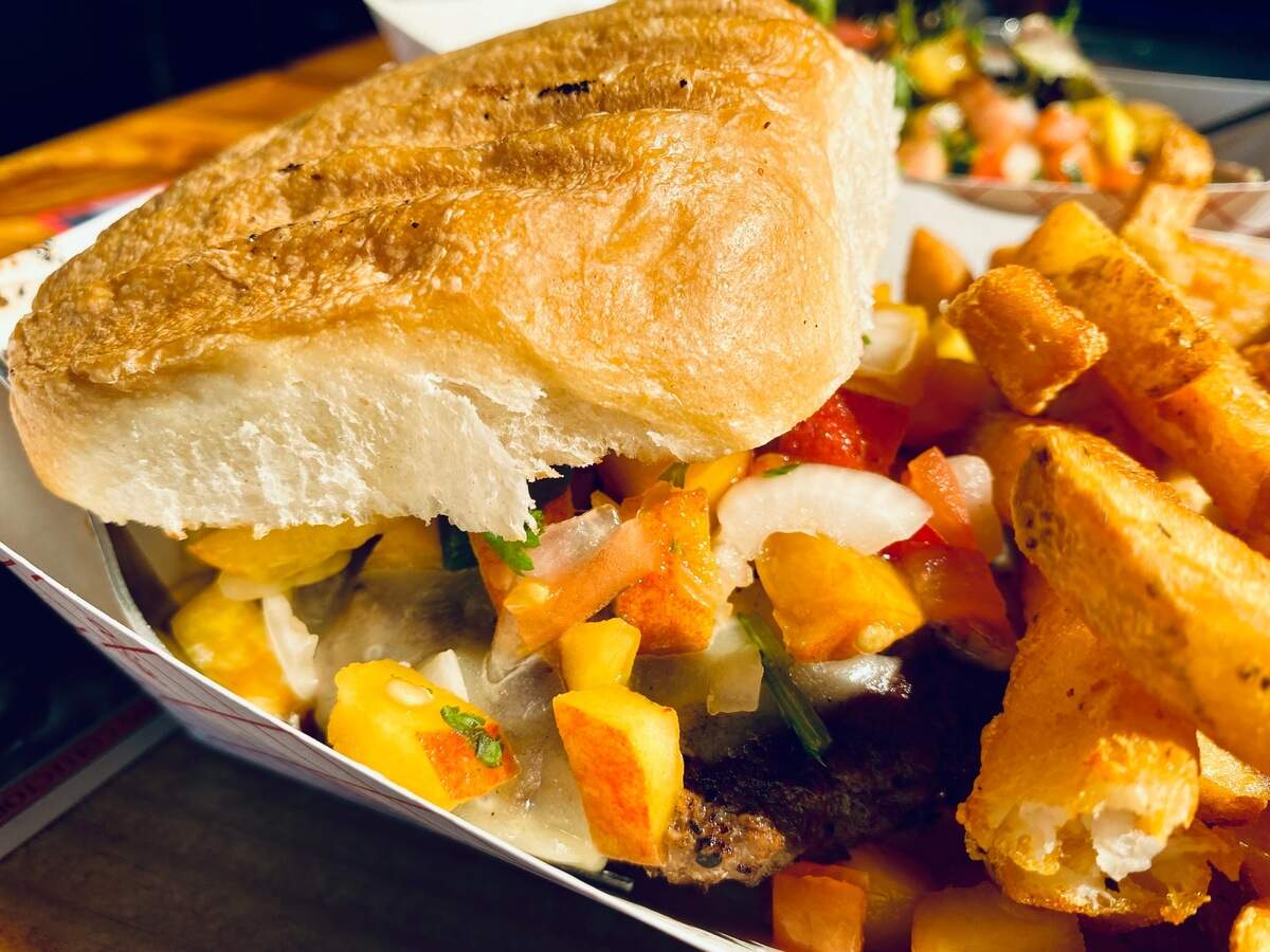A burger with peach pico de gallo at Shep’s in Weatherford.