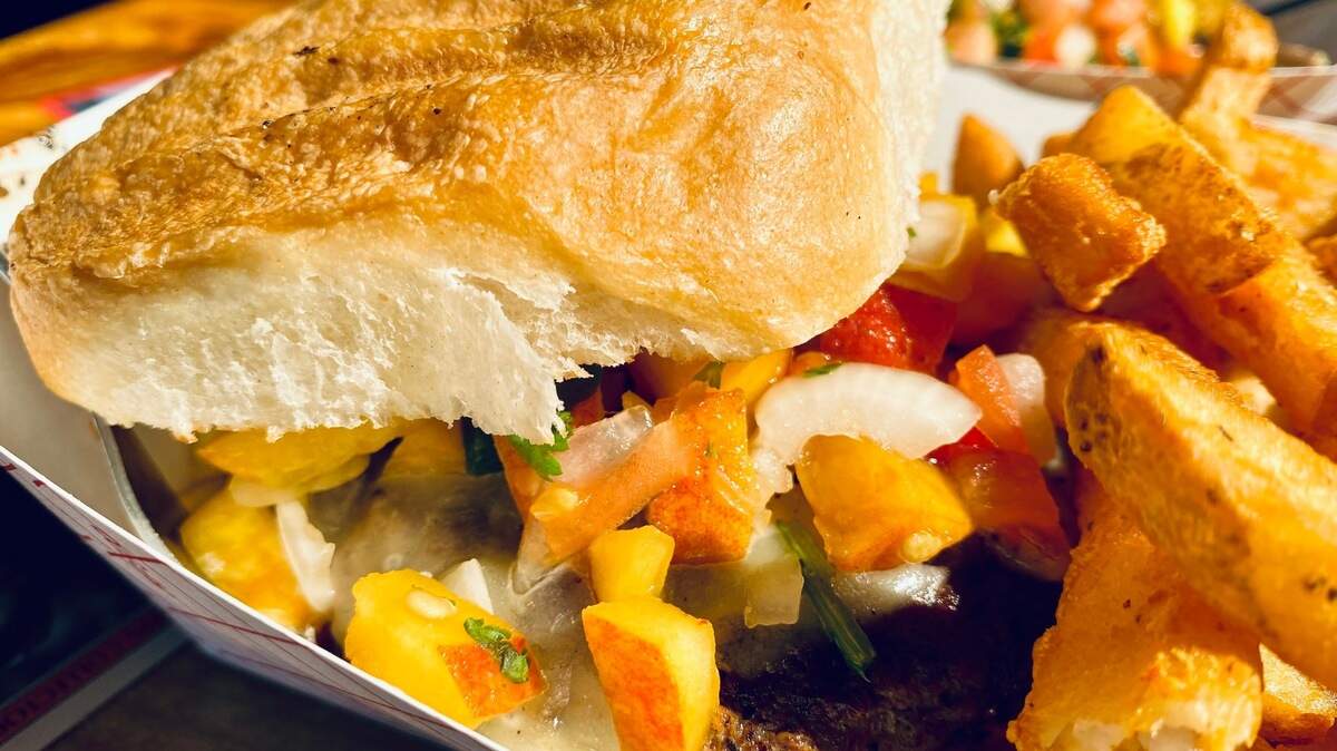 A burger with peach pico de gallo at Shep’s in Weatherford.