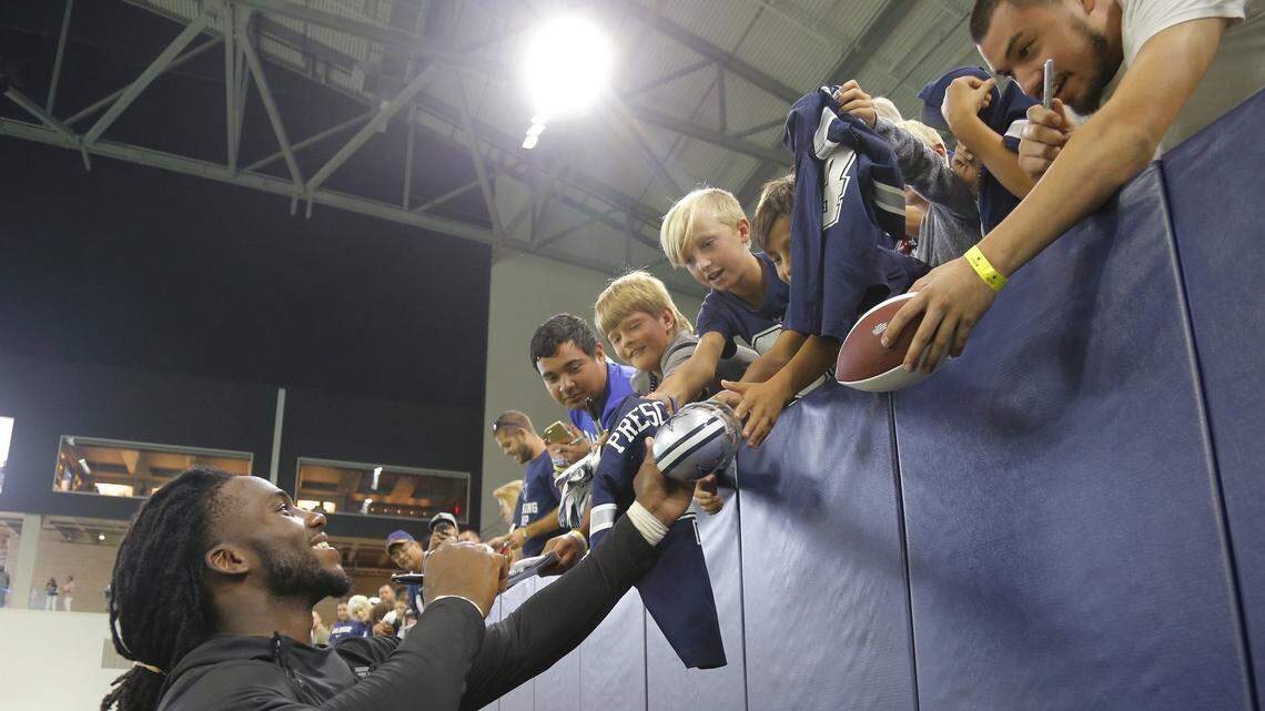 Linebacker Jaylon Smith signs autographs after the Dallas Cowboys practiced at The Star in Frisco last week.