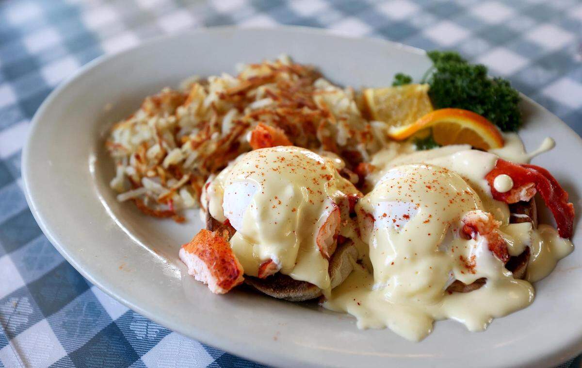 The Maine Lobster Benedict at Lucile’s features two poached eggs on chunks of Maine lobster and hollandaise sauce on an English muffin.