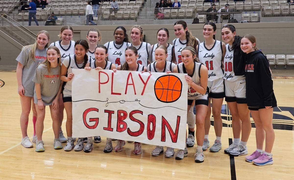 The Argyle Eagles girls basketball team poses after defeating Burleson Centennial 68-27 in a Class 5A bi-district game on Tuesday, February 13, 2024 at the Thomas Coliseum in Haltom City, Texas.