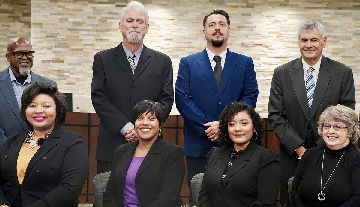 Everman school trustees (from left) Woodman Dawson, Ramonda Fields, Ricky Burgess, Superintendent Dr. Felicia Donaldson, Adan Covarrubias, Earnestine Palos, Gary Balch, Linda Lutrick.
