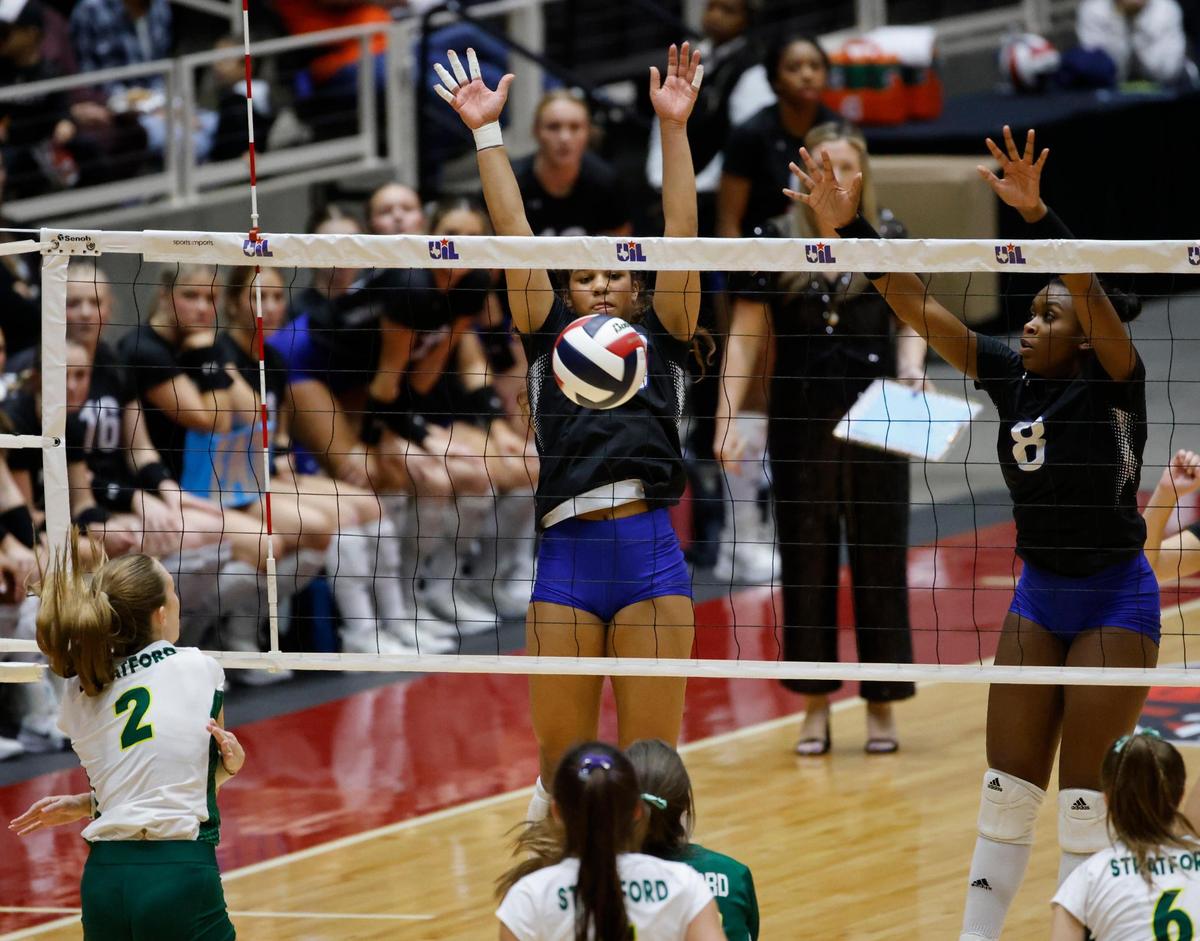 Byron Nelson Sophee Peterson (10) blocks the ball back to the Spartans during the UIL 6A D2 State Final volleyball match at Curtis Culwell Center in Garland Texas, Saturday, Nov. 23, 2024.