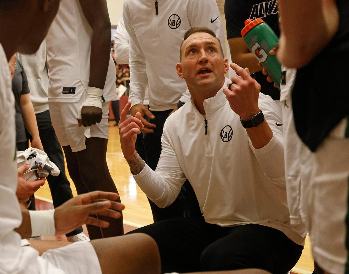 Birdville head coach Anthony Holman talks to the team with under a minute remaining during the second half of the UIL 5A state semifinal playoff basketball playoff game at Lewisville High School in Lewisville Texas, Tuesday, Mar. 04, 2025.