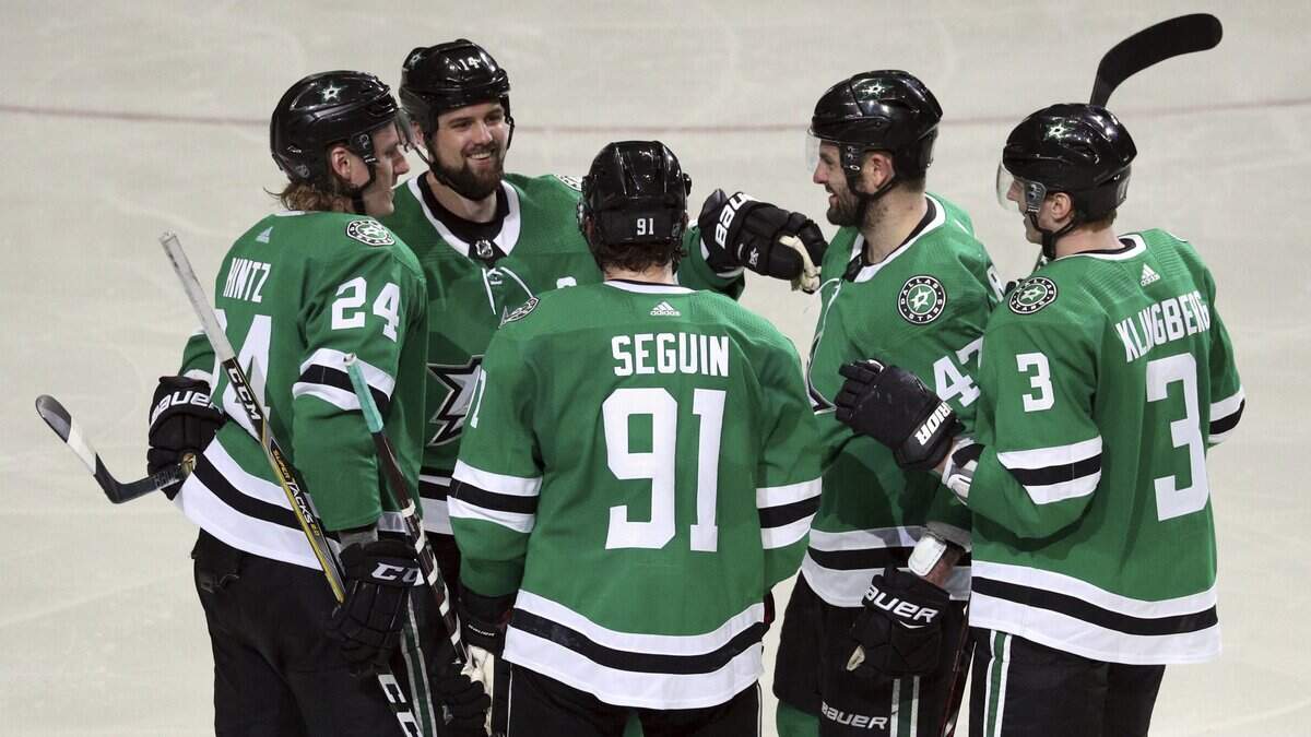 Dallas Stars’ Roope Hintz (24), Jamie Benn (14), Alexander Radulov (47), and John Klingberg (3) celebrate a third-period goal by center Tyler Seguin (91) in an NHL hockey game against the Minnesota Wild, Saturday, April 6, 2019, in Dallas. (AP Photo/Richard W. Rodriguez)