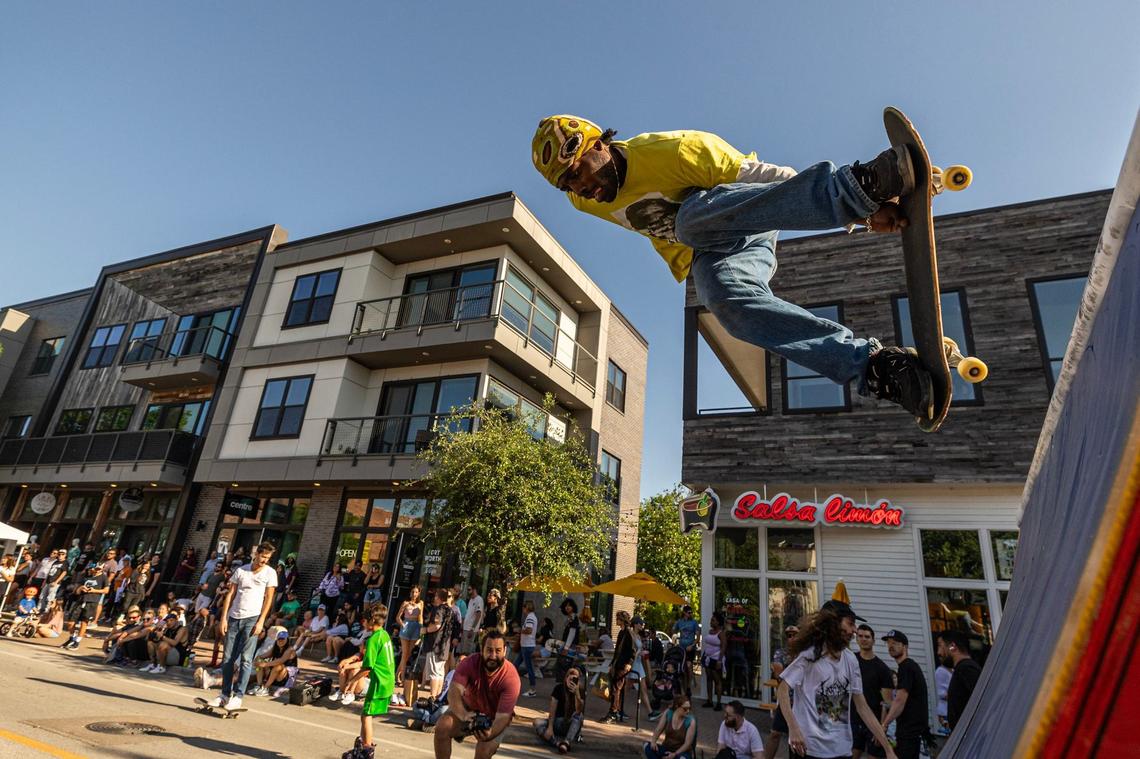 A skater performs a skate trick on a ramp in the skate jam area of Open Streets on Magnolia Avenue in Fort Worth on Saturday, April 13, 2024. Open Streets, hosted by local nonprofit Near Southside Inc returned Saturday after the pandemic derailed it five years ago.