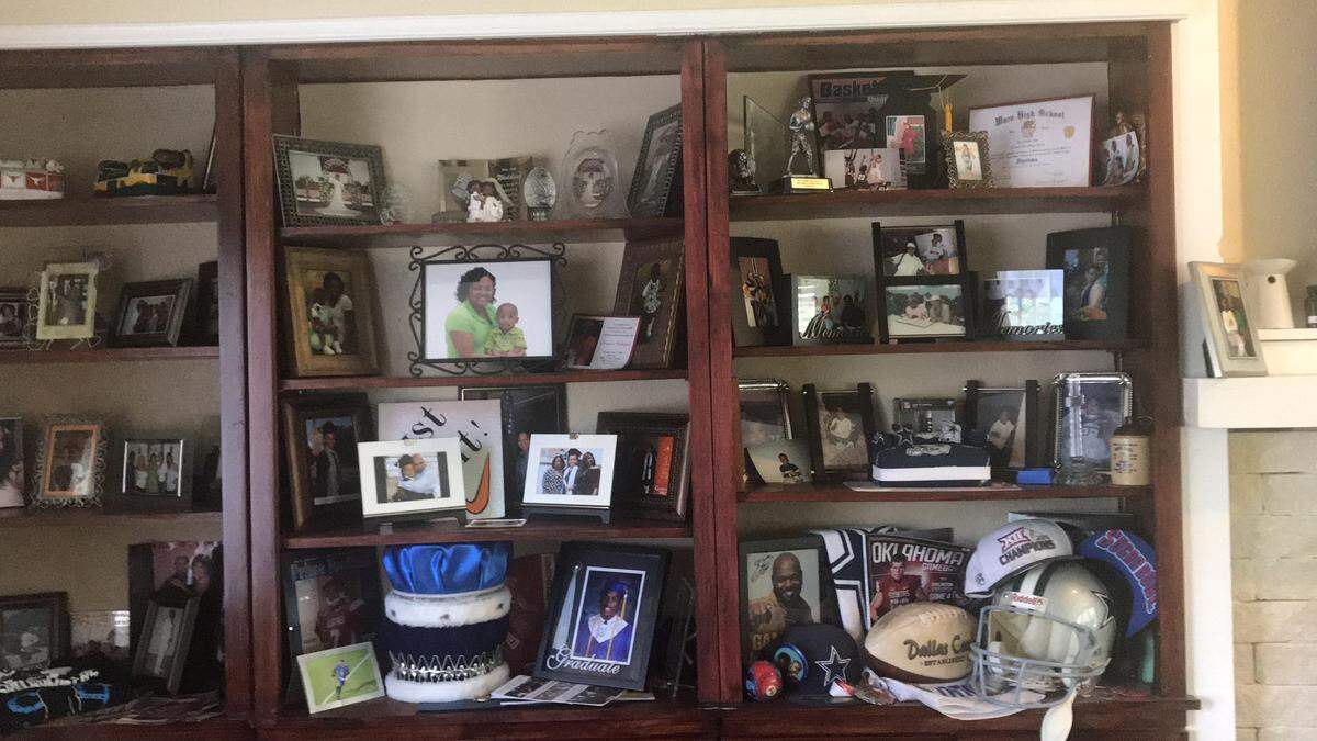 Loads of trophies and accomplishments adorn the "Fun Room" in the Cobb home in Waco.