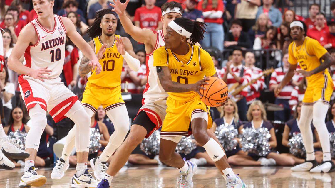 Arizona State guard DJ Horne (0) looks to pass the ball as Arizona guard Kerr Kriisa, obscured, during the Pac-12 Tournament last week in Las Vegas.