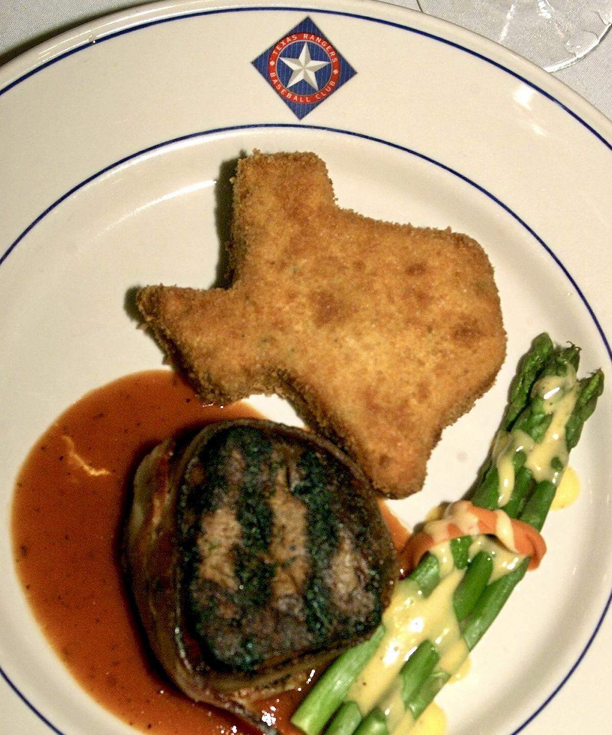 Texas-shaped potatoes, steak and asparagus were served for lunch to the U.S. Olympic Committee June 20, 2001 at the Ballpark in Arlington. The United States Olympic Committee stopped at the ballpark during their two-day tour of the metroplex.