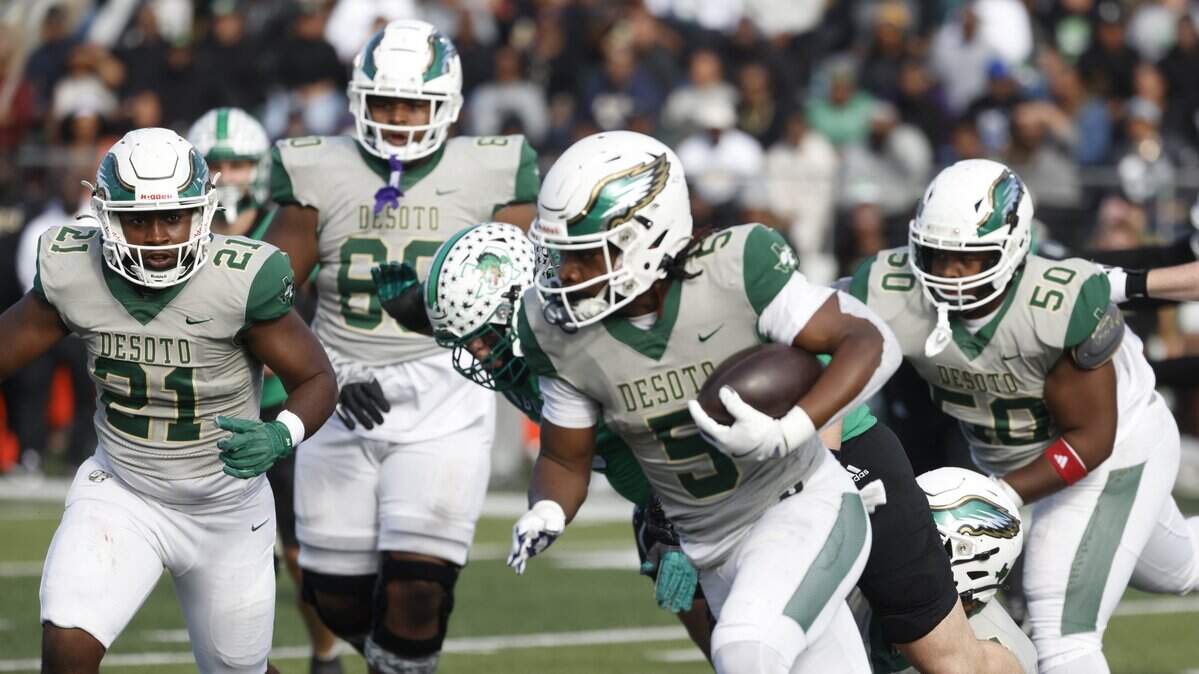 DeSoto running back SaRod Baker (5) rounds the left side against Southlake Carroll during the first half of a UIL Class 6A Division II semifinal on Saturday Dec. 13, 2025 at Vernon Newsom Stadium in Mansfield, Texas.