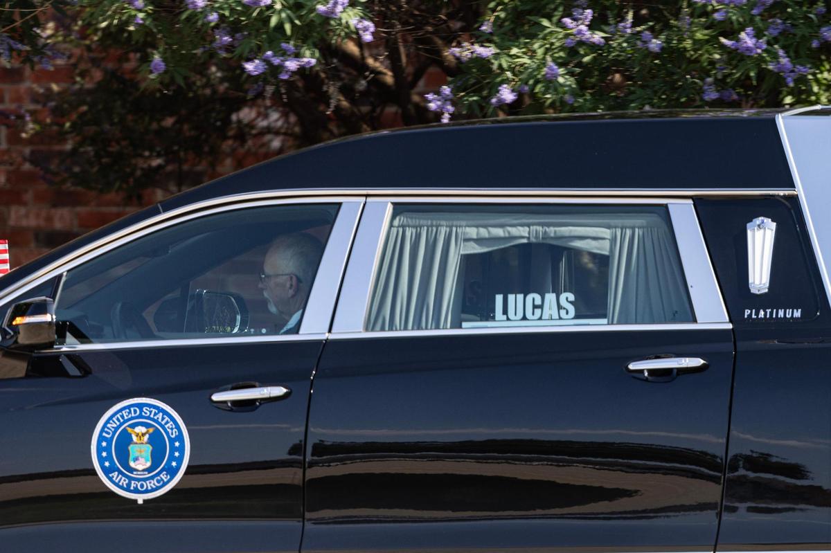 The hearse driver exits the ceremony following the funeral of Ava Moore at the Met Church on Saturday, May 31.